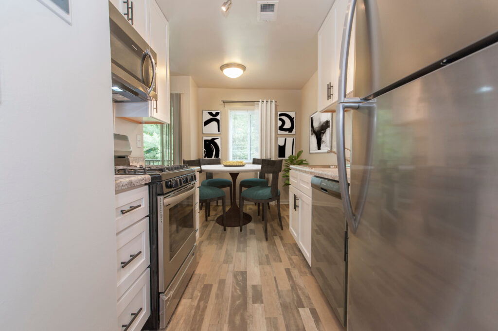 The kitchen of a 2 bedroom, 2 bathroom apartment unit